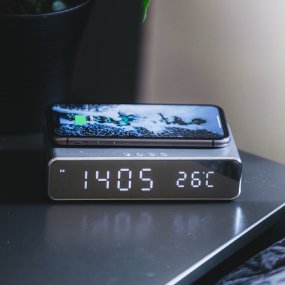 Digital alarm clock with Qi charger