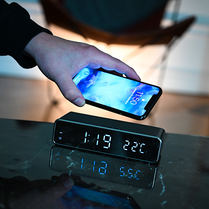 Digital alarm clock with Qi charger