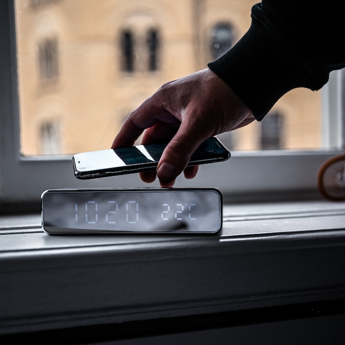 Digital alarm clock with Qi charger